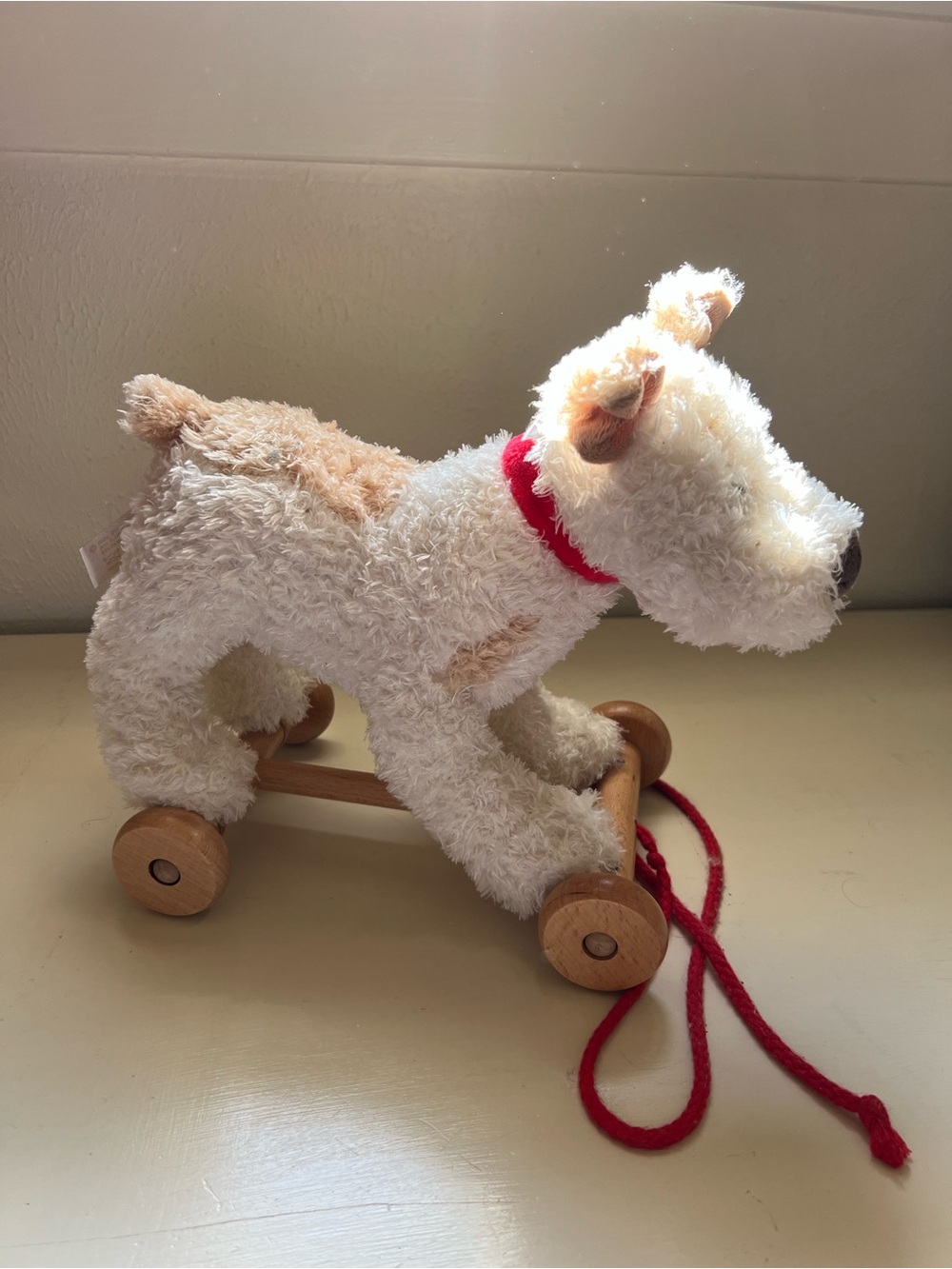 Egmont Plush Pull-Along Dog Toy in Cream and Tan with Red Cord